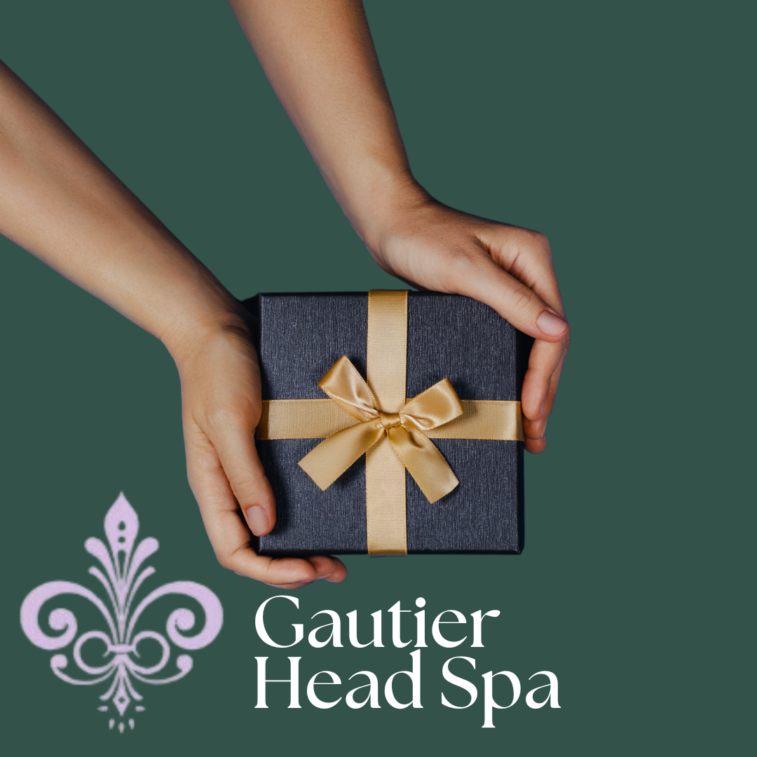 Salon Gautier gift certificate — hands holding a wrapped gift